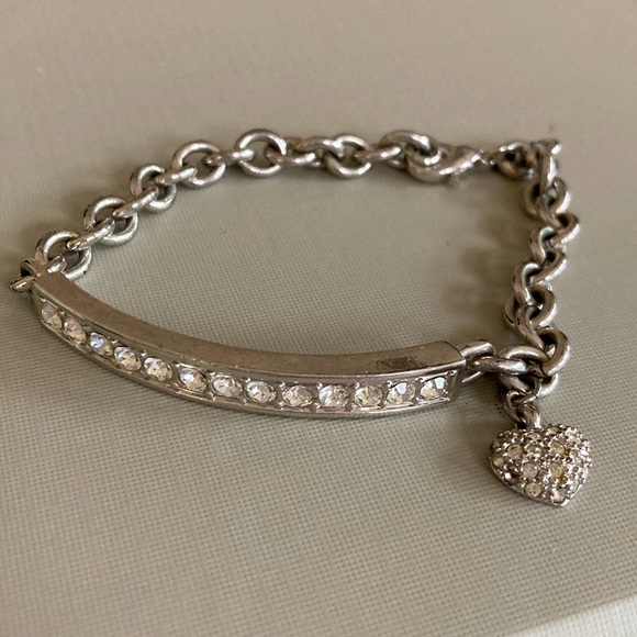 Crystal rhinestone bracelet with heart encrusted rhinestone hang charm. - Picture 1 of 5